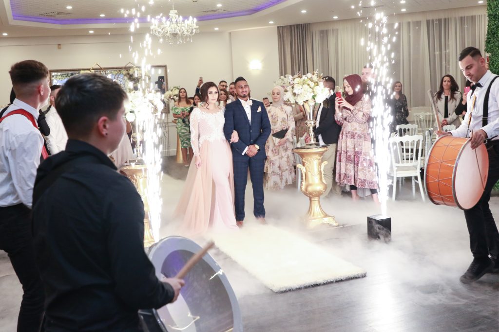 entering bride & groom at their wedding reception in Sydney